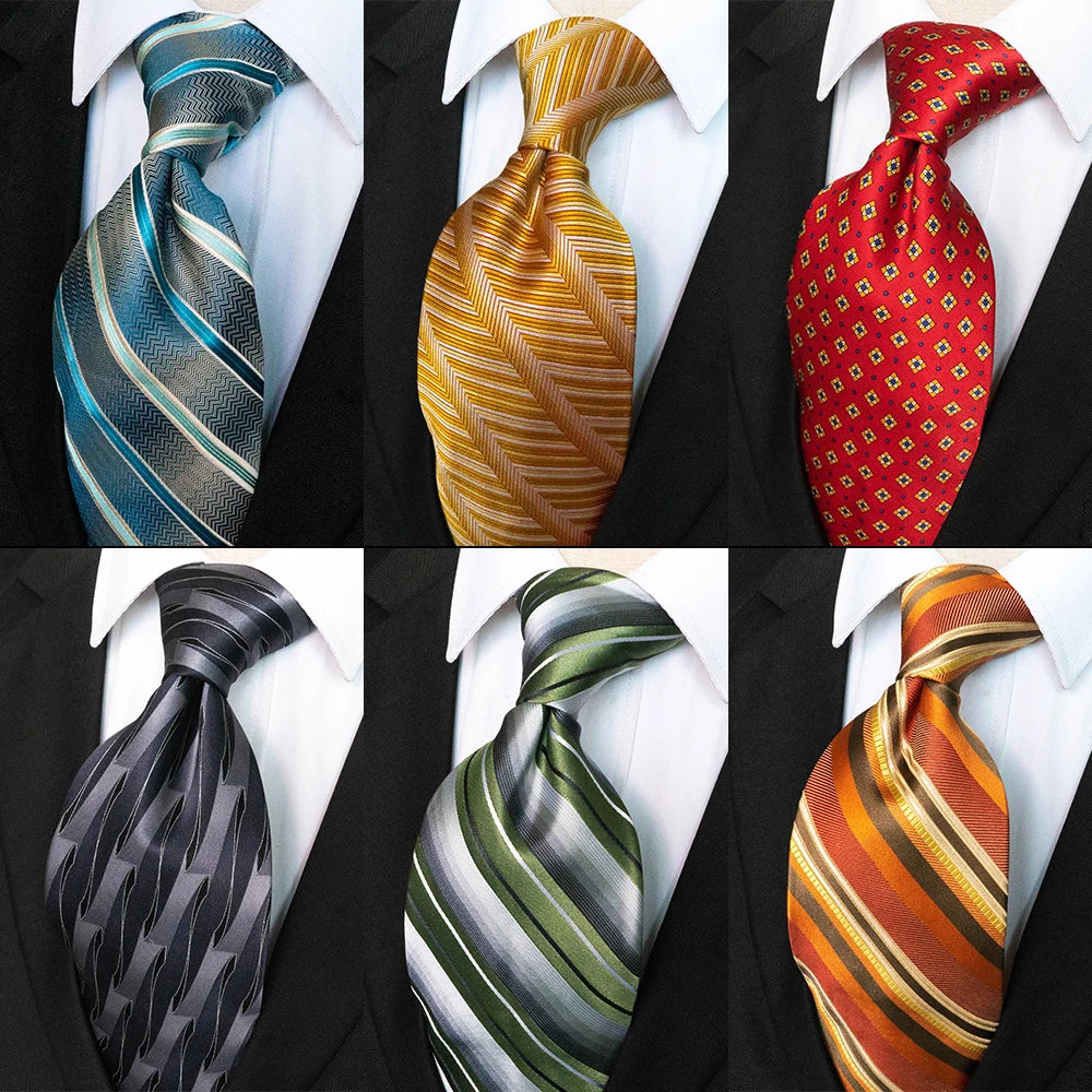 Sáu cà vạt nhiều màu: xanh, vàng, đỏ, xám, xanh lá, cam trên áo sơ mi trắng và vest đen.