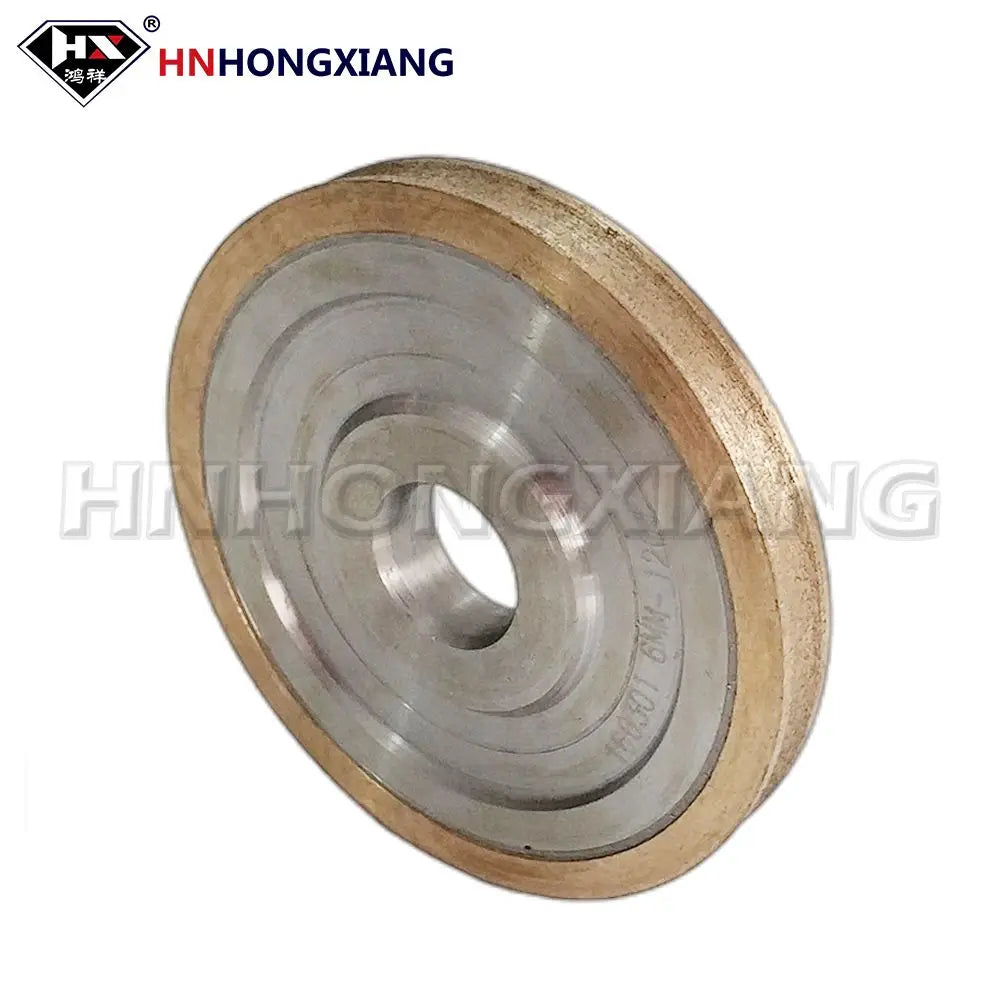Bánh mài tròn, viền vàng, trung tâm xám, trên nền trắng.