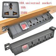 Ổ cắm điện đa năng màu đen với công tắc đỏ, điện áp 250V, 10A, gắn trên thanh gỗ.
