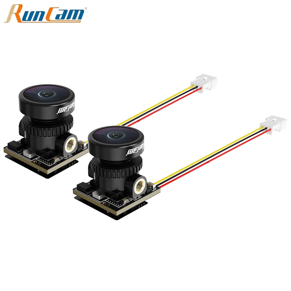 Hai camera mini màu đen có dây màu đỏ, vàng, đen, và trắng nối vào cổng trắng.