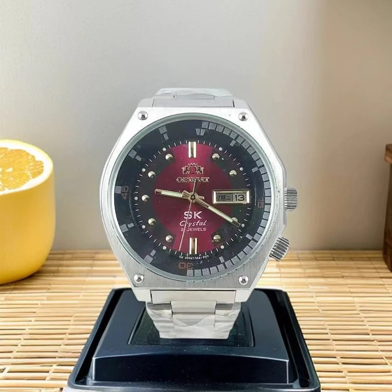 Orient men's mechanical watch with exposed machine, luminous, water resistant