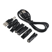 Dây cáp USB màu đen và nhiều đầu cắm chuyển đổi nhỏ, màu đen, đặt trên nền trắng.
