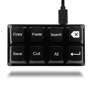Bàn phím mini màu đen, 8 phím: Copy, Paste, Search, Save, Cut, All, phím điều hướng và xóa.