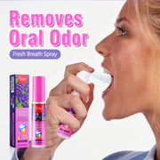 Người phụ nữ xịt chai màu hồng vào miệng, nền chữ "Removes Oral Odor" màu hồng.