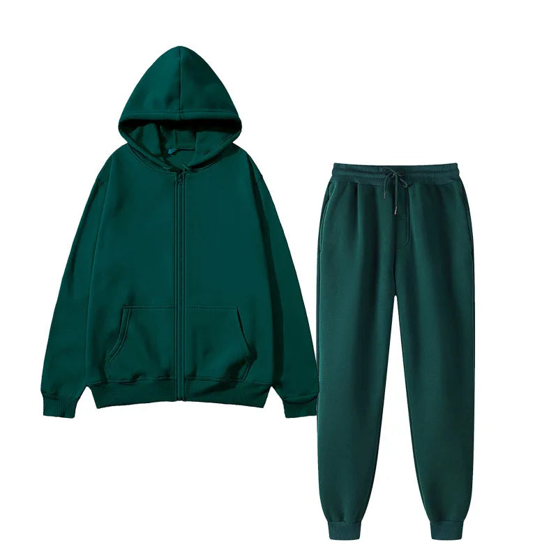 Bộ đồ thể thao xanh đậm gồm áo hoodie có mũ và quần dài, chất liệu vải mềm mại.
