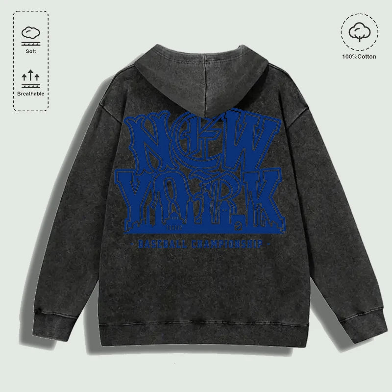 Áo hoodie màu xám đen, chữ "NEW YORK" màu xanh đậm lớn ở lưng, chất liệu cotton mềm.