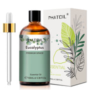 Chai dầu khuynh diệp Phatoil 100ml, hộp nền trắng có họa tiết lá xanh.