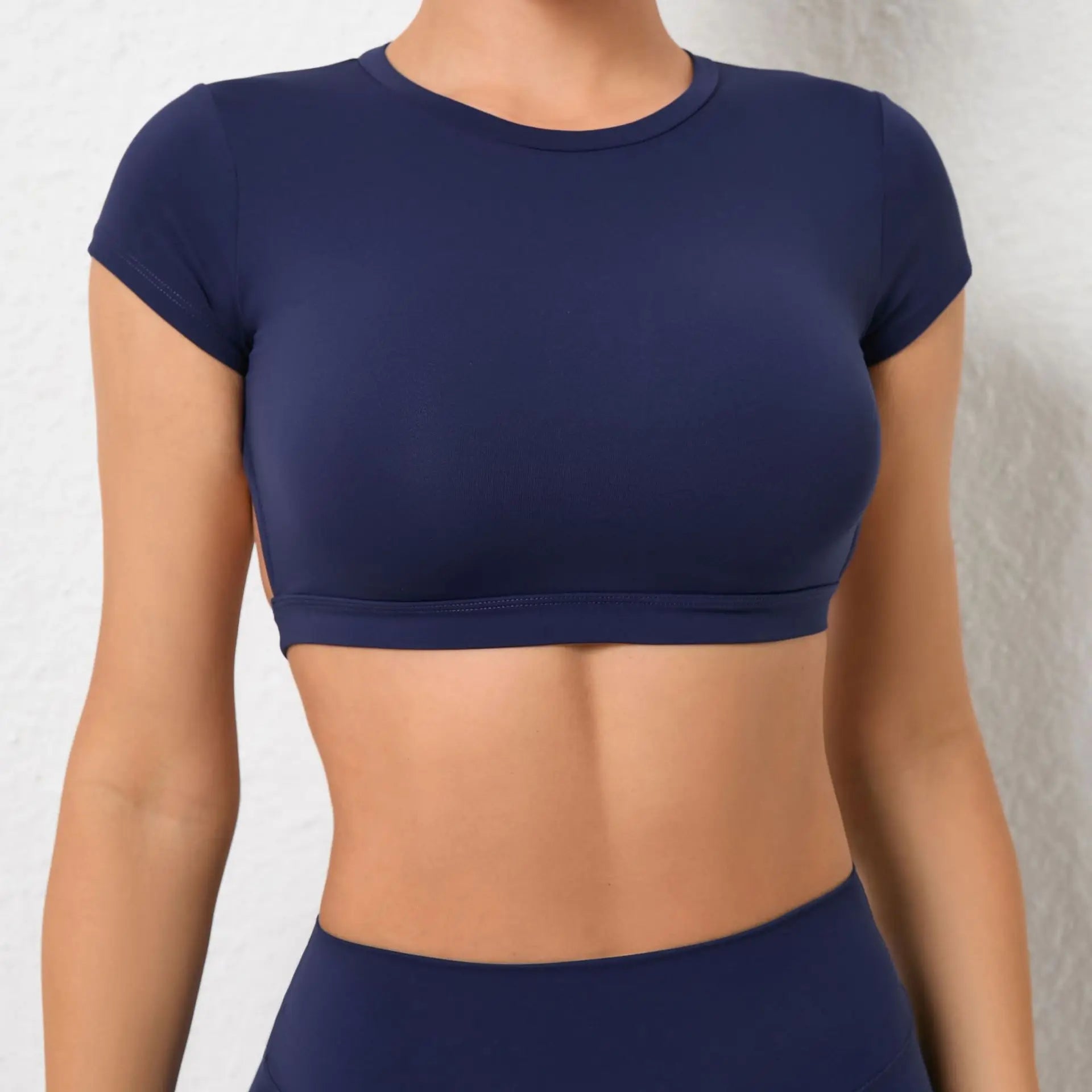 Áo Thể Thao Nữ Thoáng Khí Hở Lưng Yoga Gym năng động - Daisan Mart