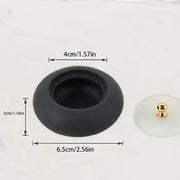 Đế cao su đen, kích thước 6.5cm x 4cm x 3cm, bên cạnh nắp tròn nhỏ màu trắng và vàng.