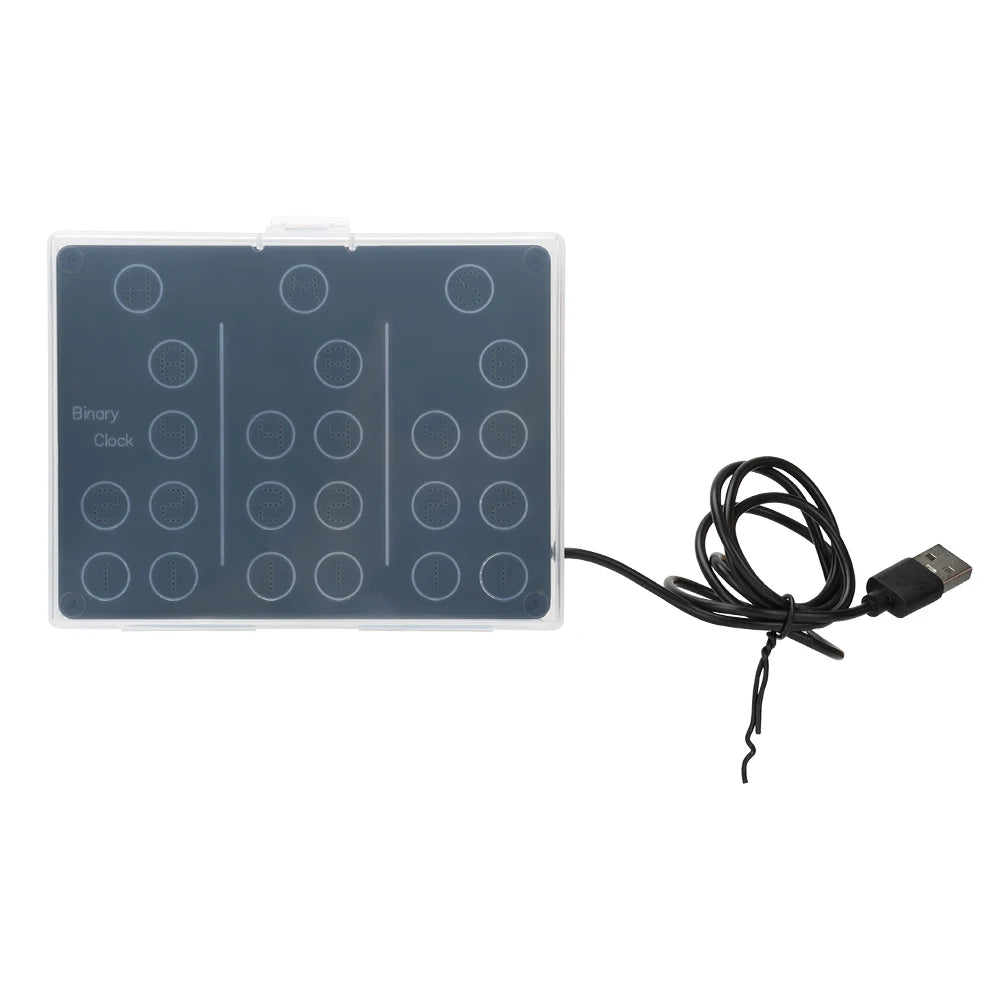 Đồng hồ nhị phân màu đen, có cáp USB, mặt trước có các đèn LED tròn.